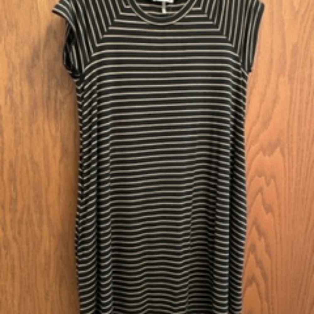 Soprano new, size small black dress with tan strips.